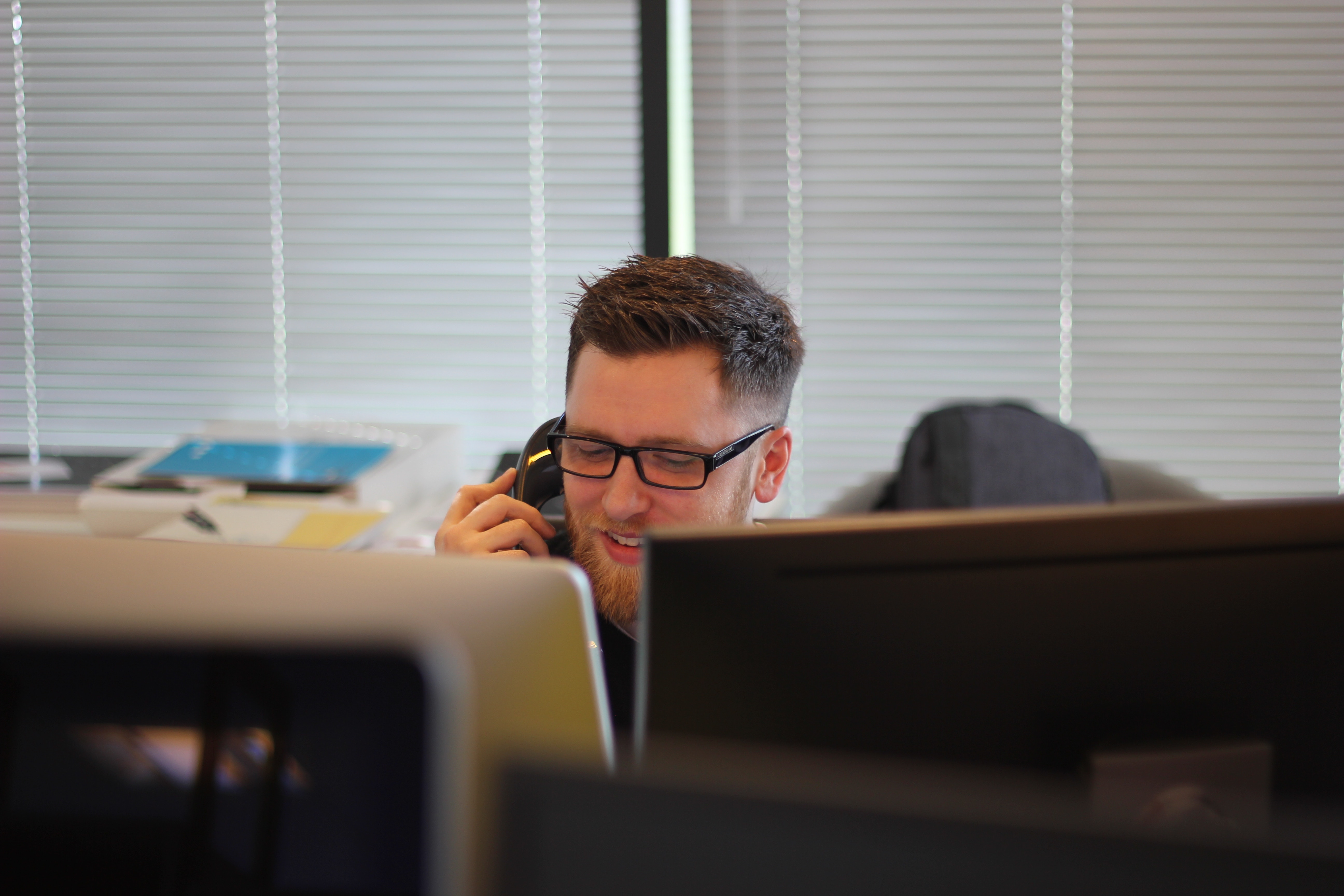 Man in office on telephone